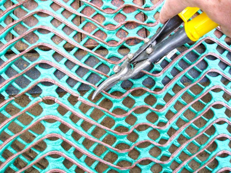 Rasenstabilisierung eines Grünstreifen im Bereich der Hofeinfahrt