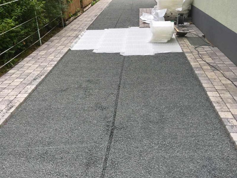 Schöne & befahrbare Kies-Einfahrt anstelle von Pflastersteinen mit den Kieswaben KW30 einfach, schnell und kostengünstig selbst anlegen.