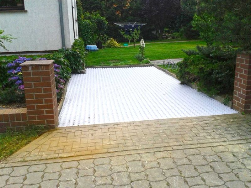 Verlegung des Kiesgitter KG30 zur unversiegelten Befestigung eines Hof