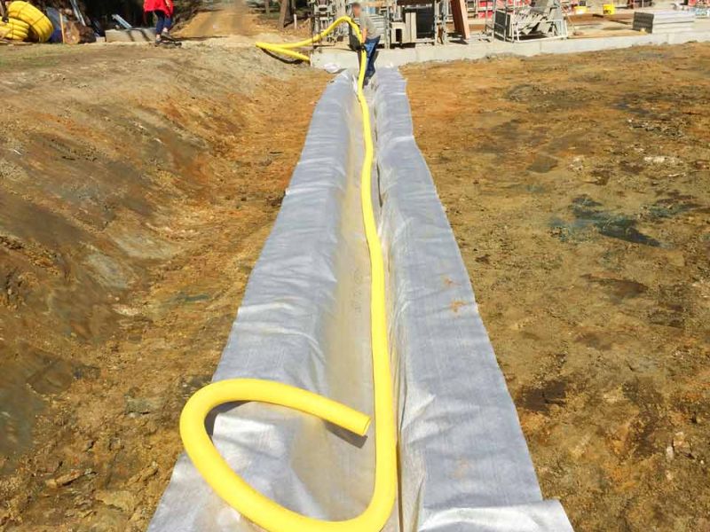 Verlegung von Paddockplatten für ein Paddock für Island-Pferde