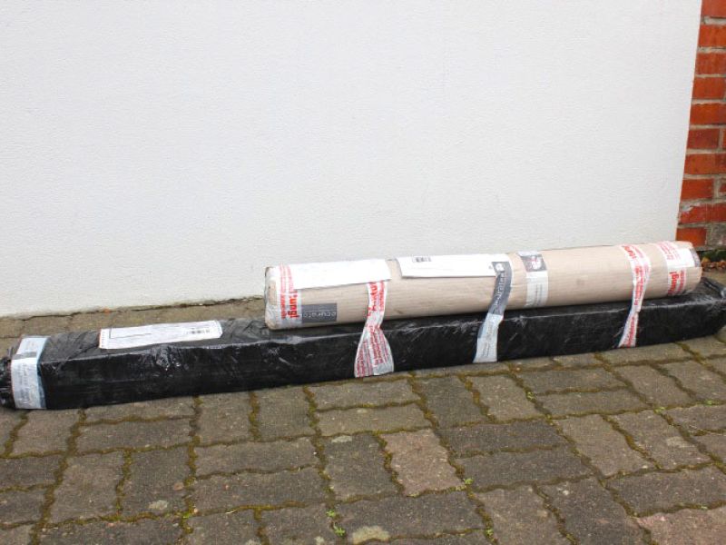 Verlegen von Kieswaben KW50 für einen stabilisierten Kiesweg im Garten