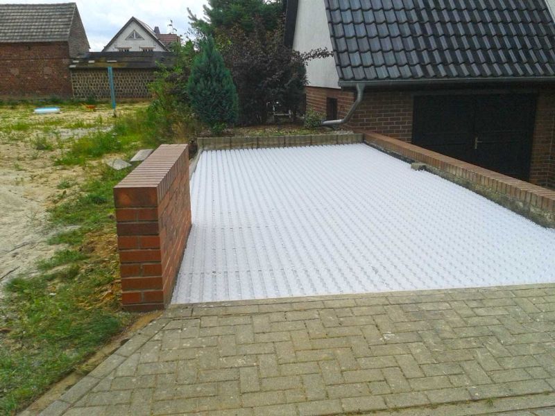 Verlegung des Kiesgitter KG30 zur unversiegelten Befestigung eines Hof