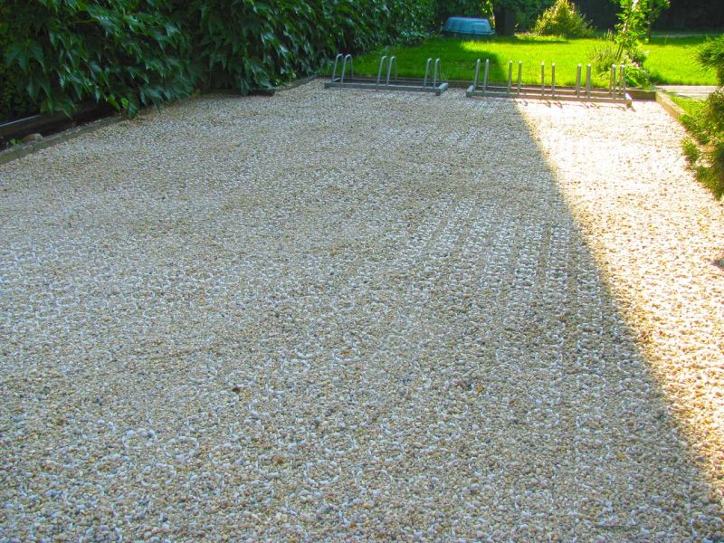 Verlegung des Kiesgitter KG30 zur unversiegelten Befestigung eines Hof