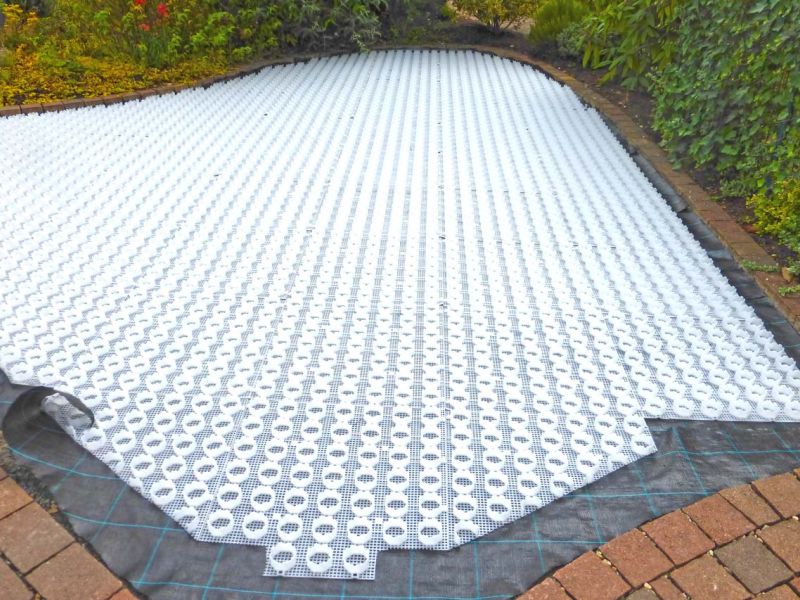 Herstellung eines PKW Stellplatz auf einer schon angelegten Kiesfläche mit dem Kiesgitter KG30