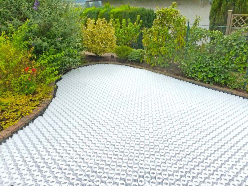 Herstellung eines PKW Stellplatz auf einer schon angelegten Kiesfläche mit dem Kiesgitter KG30