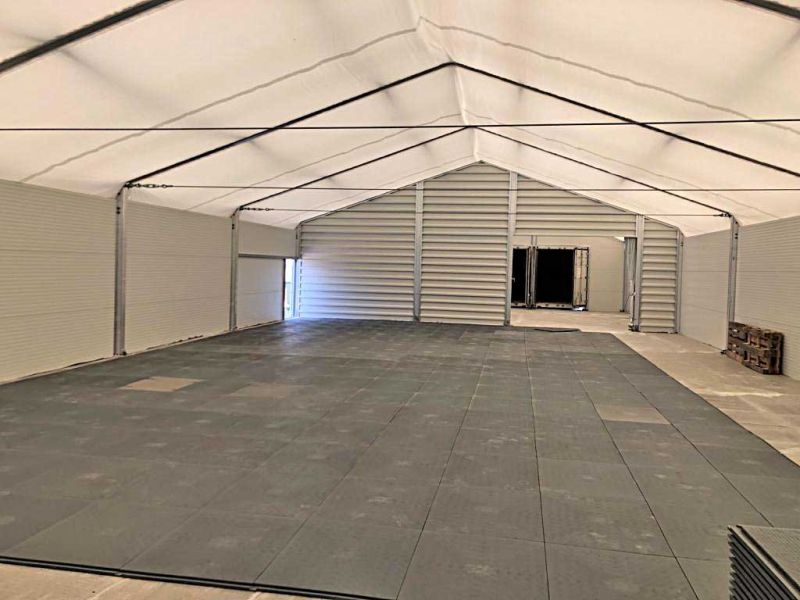 Verlegen eines sicheren Zeltbodens aus FastFloor-Bodenmatten